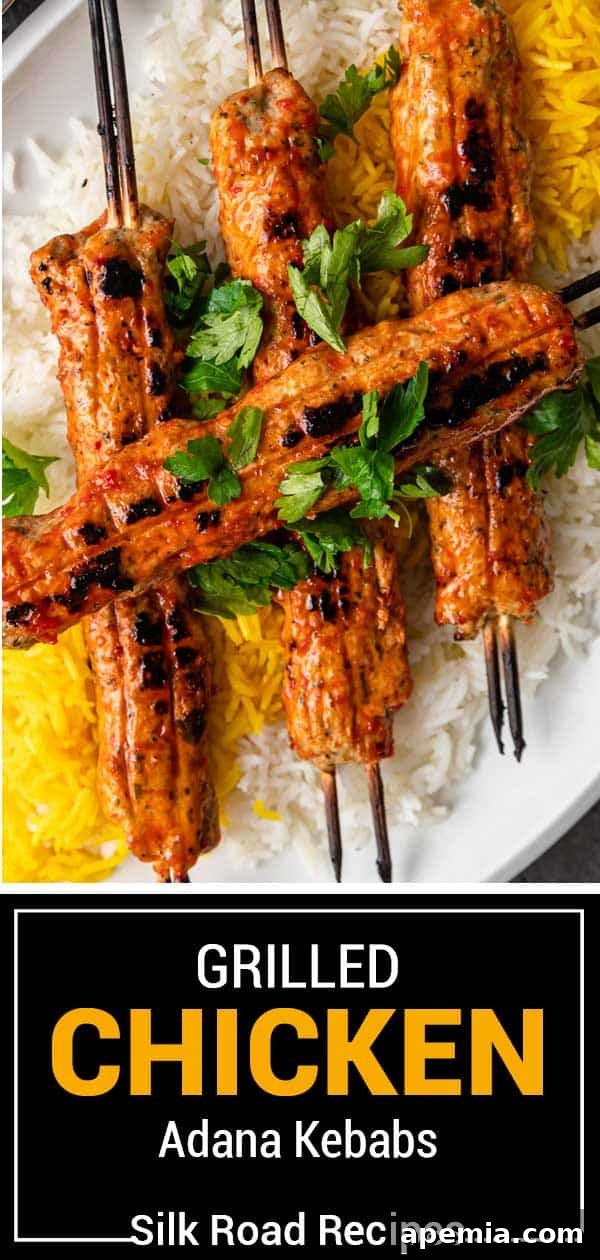 Titled image: grilled chicken Adana kebabs, a close-up delicious shot