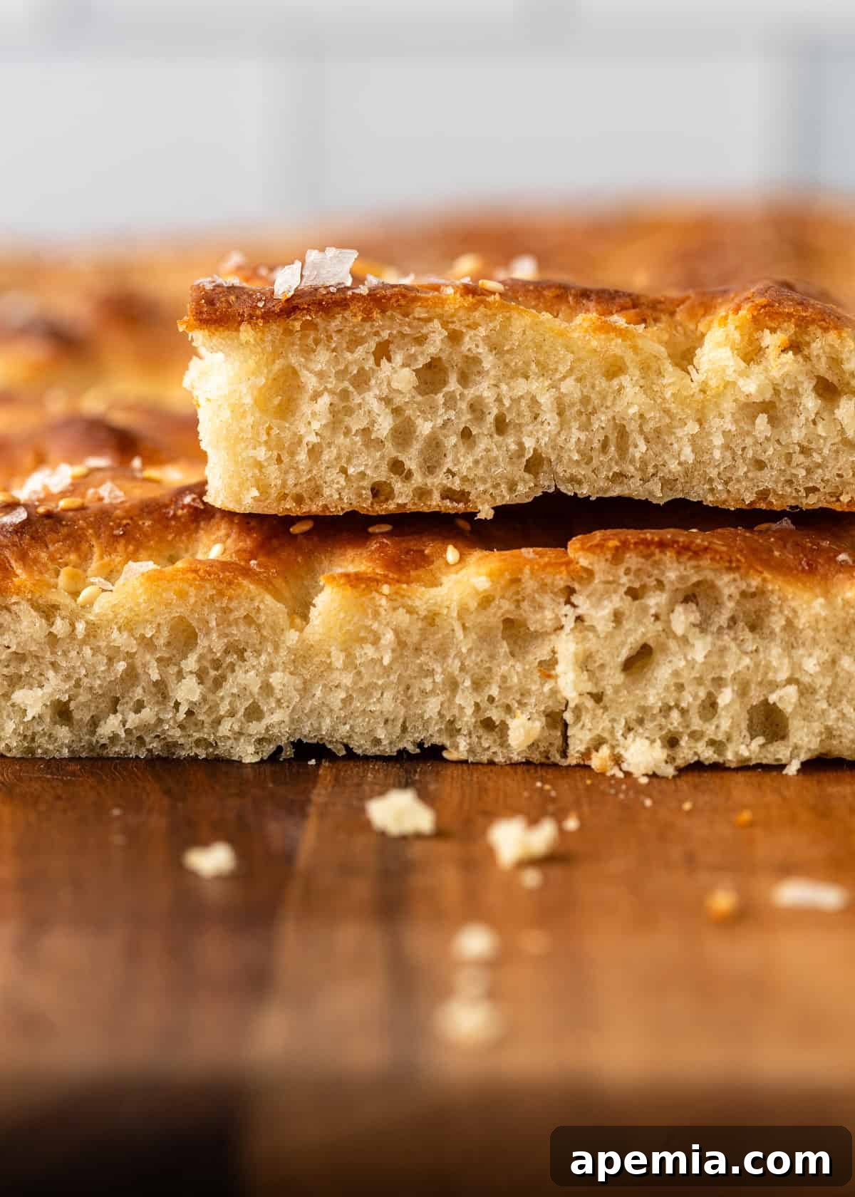 side view closeup: a stack of focaccia bread with interior showing