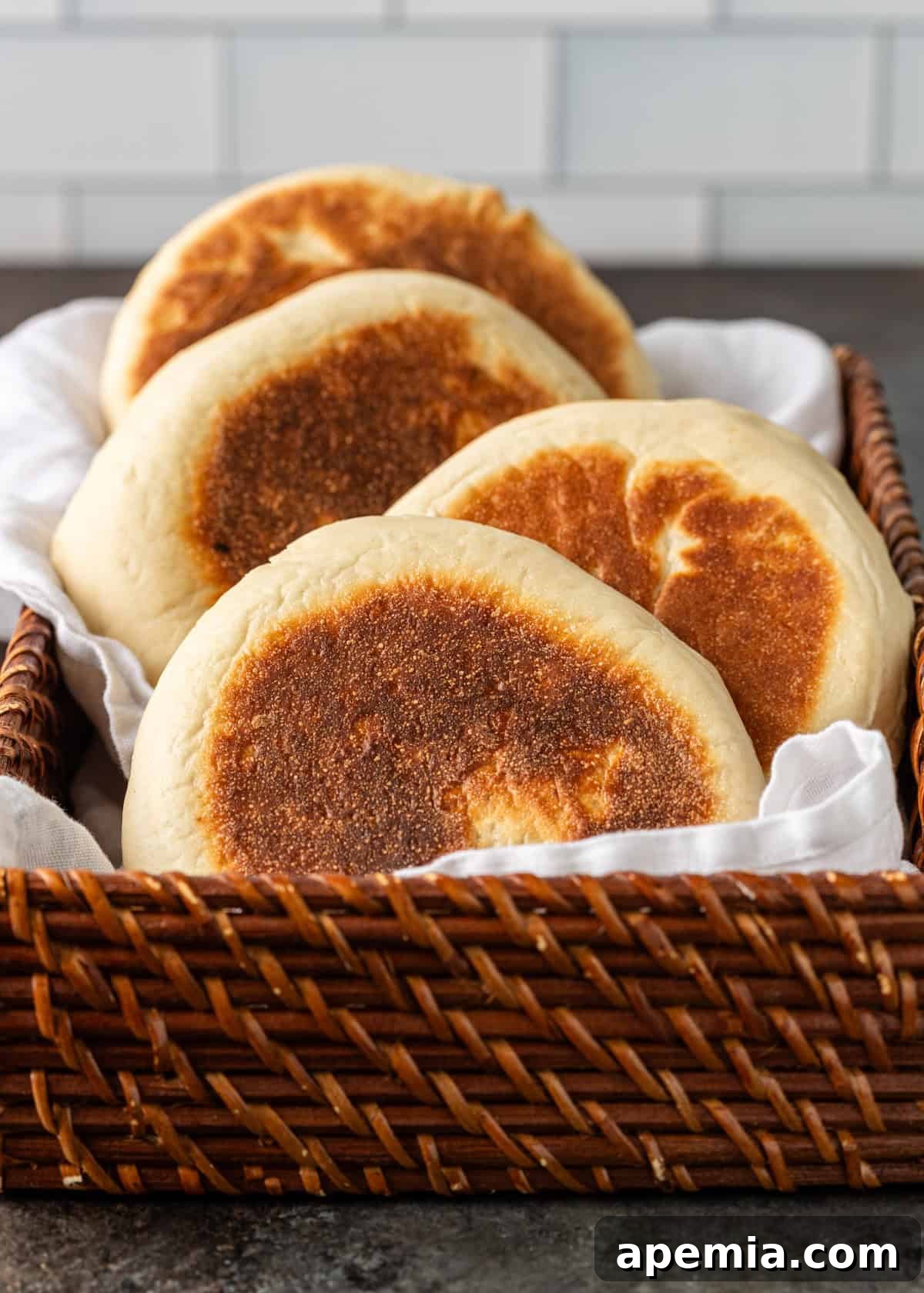 A charming woven basket overflowing with freshly baked Turkish flatbread, arranged to showcase its rustic appeal.