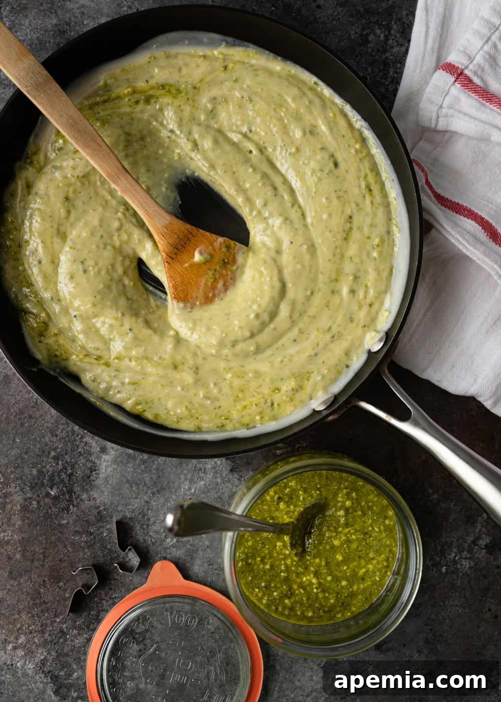 pesto alfredo sauce in skillet