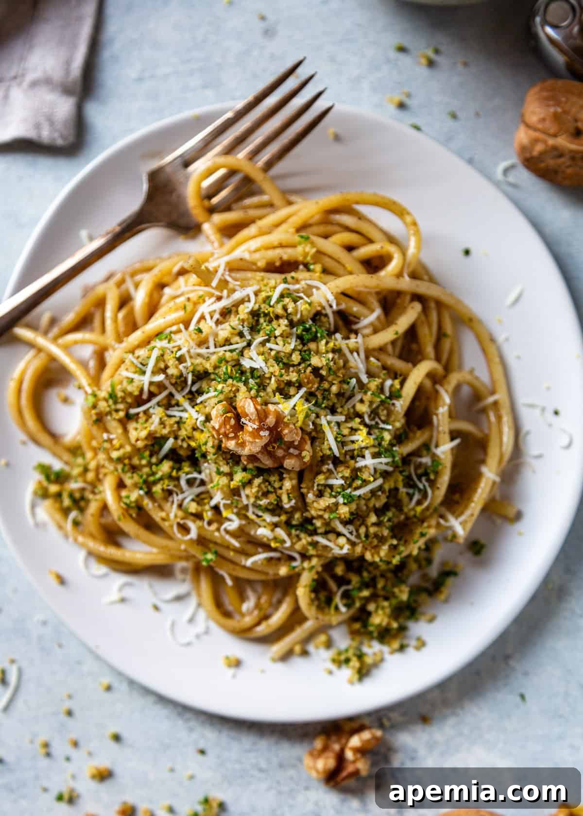 overhead: my walnut pangrattato generously sprinkled over a plate of luscious brown butter pasta