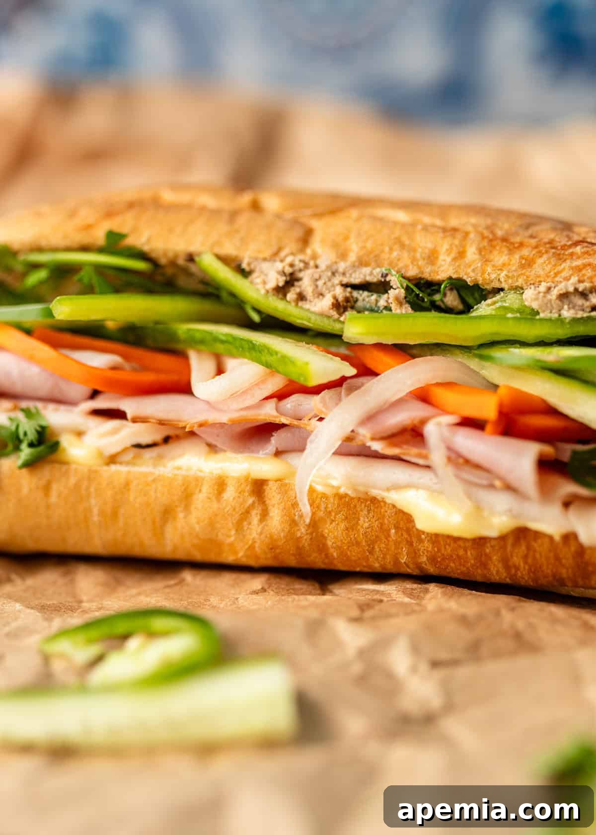 Crisp Vietnamese Pickled Daikon and Carrots 8 closeup: a bahn mi sandwich with Vietnamese pickled carrots and daikon