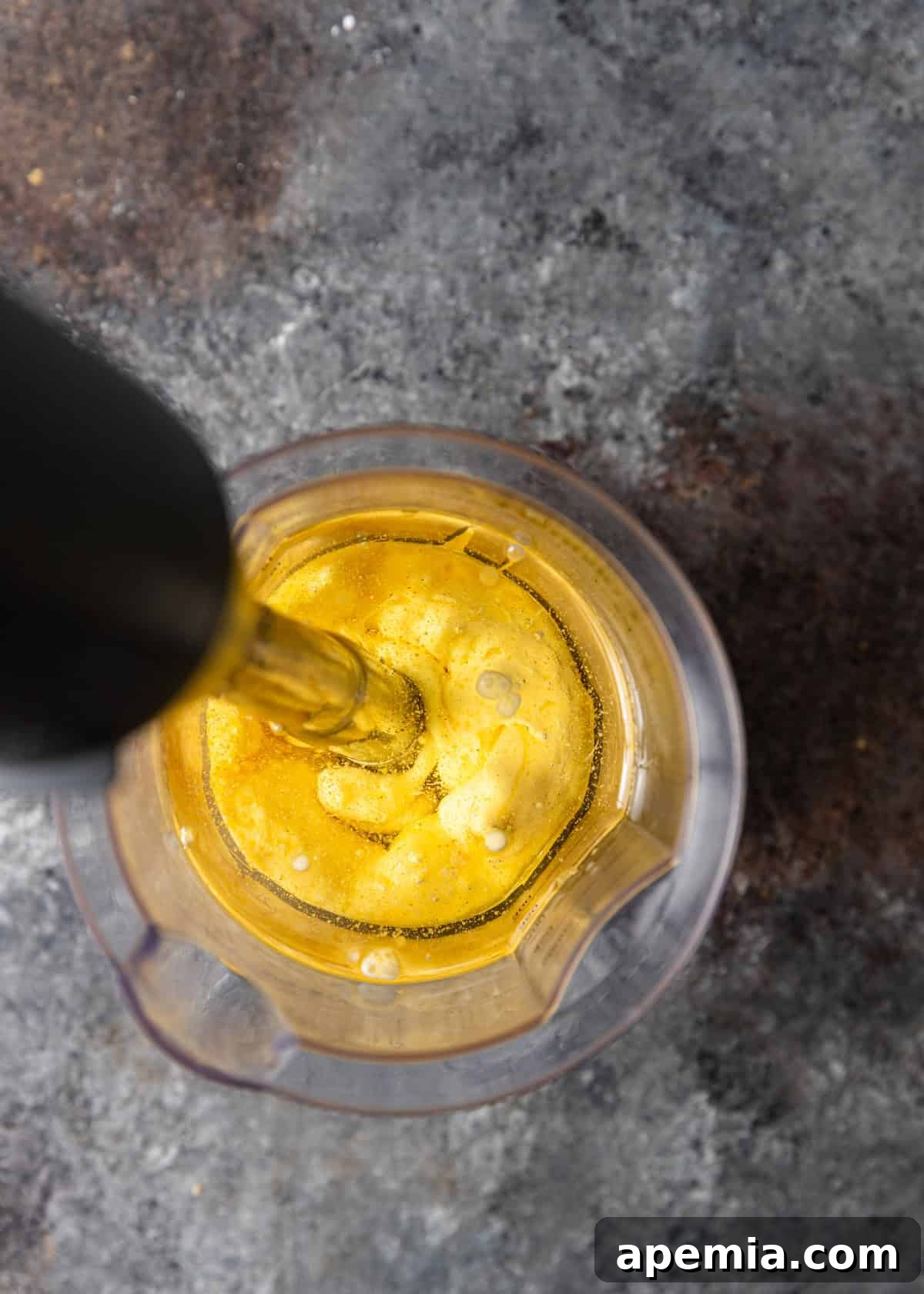 overhead process shot: blending mayo in immersion blender