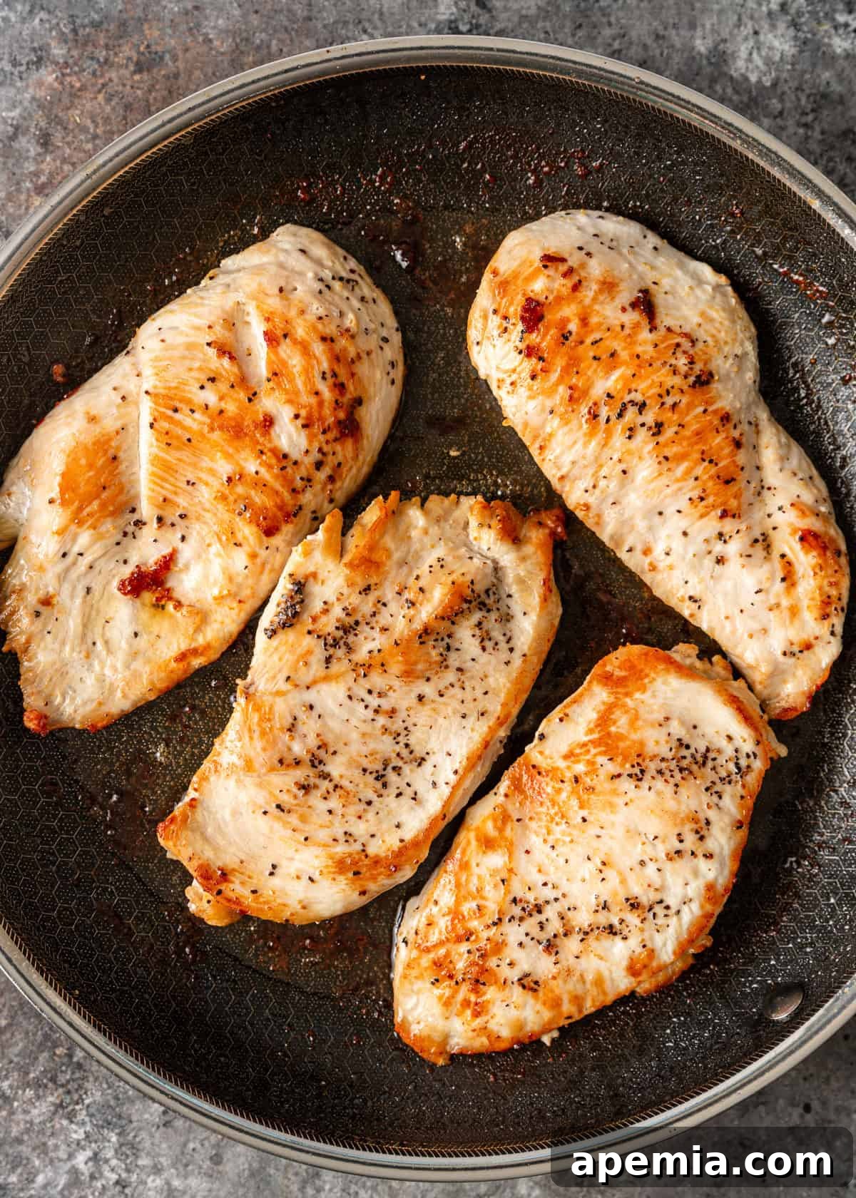 Creamy Hungarian Chicken Delight 5 overhead process shot: pan searing chicken breast