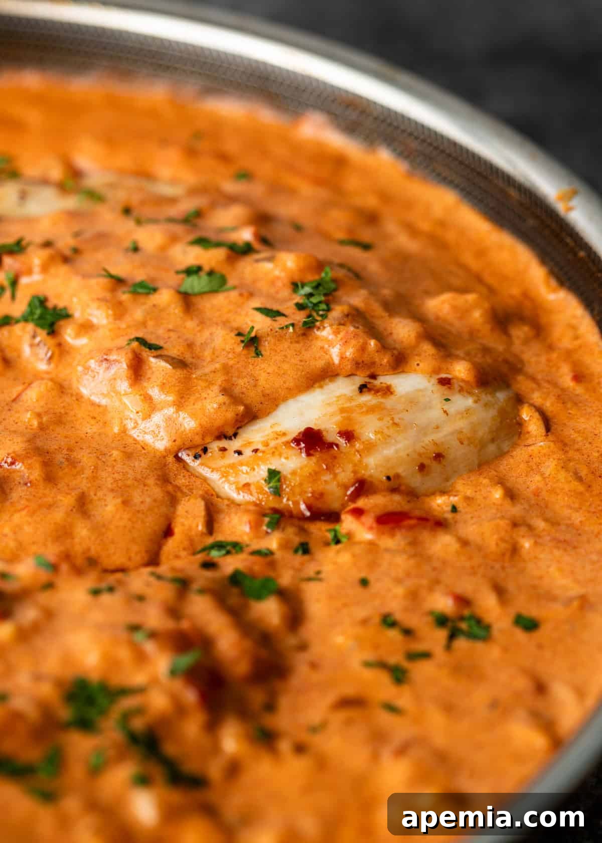 Creamy Hungarian Chicken Delight 10 closeup: my chicken paprikash recipe in a skillet with sauce