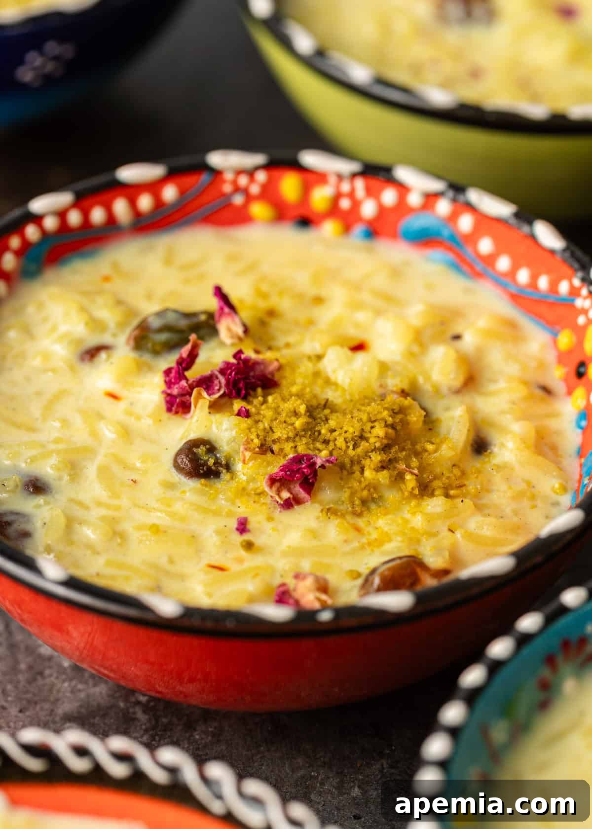 Indian Kheer Sweet Perfection 3 closeup: Indian rice pudding with dried rose petals and ground pistachios on top