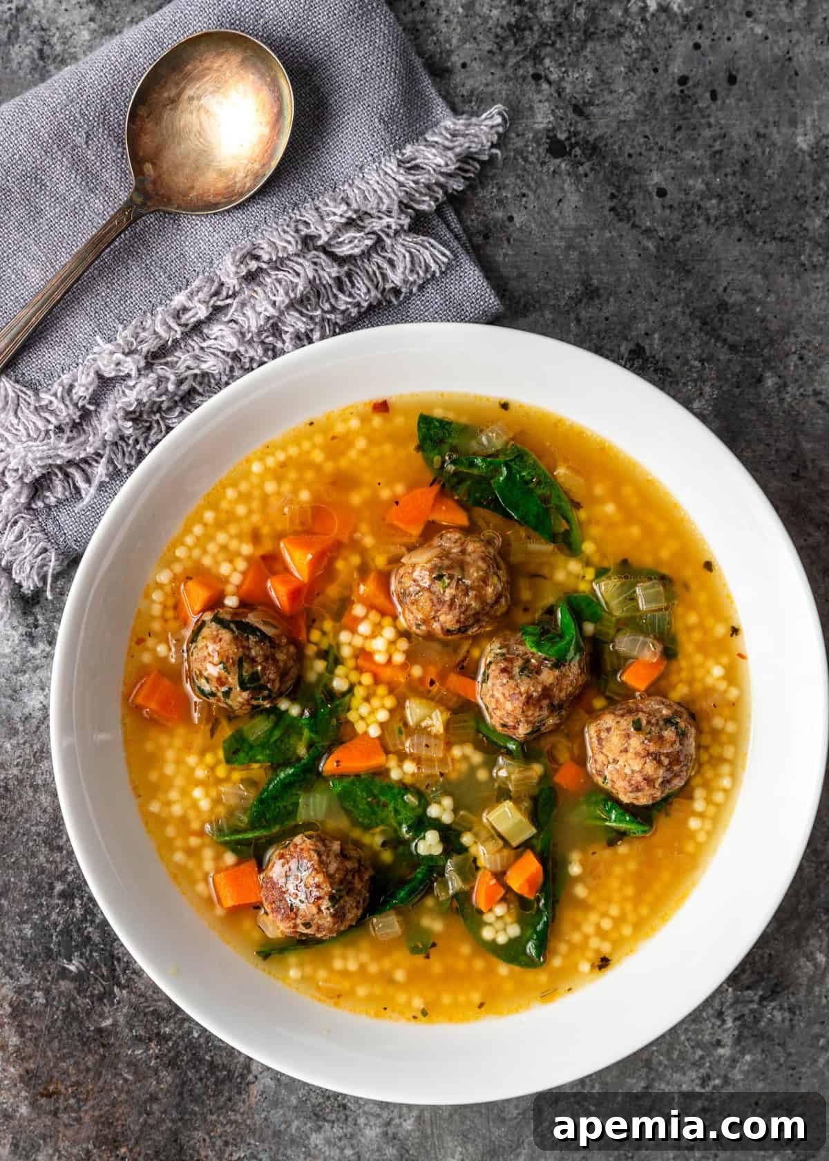 overhead: a big bowl of my Italian wedding soup recipe with meatballs, pasta, and vegetables