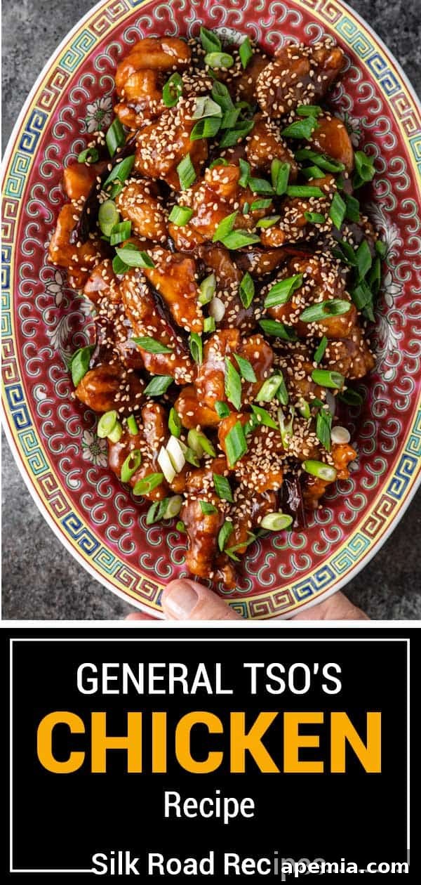 Titled image showing a full bowl of General Tso's chicken recipe, ready to be served, highlighting its rich texture and appetizing presentation.