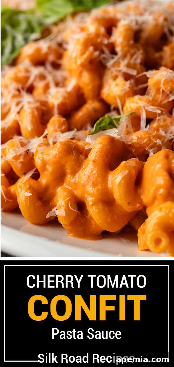 Titled image showing a serving of creamy cherry tomato confit pasta sauce