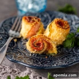 Crispy Zucchini Involtini (Zucchini Rolls) on a serving plate.