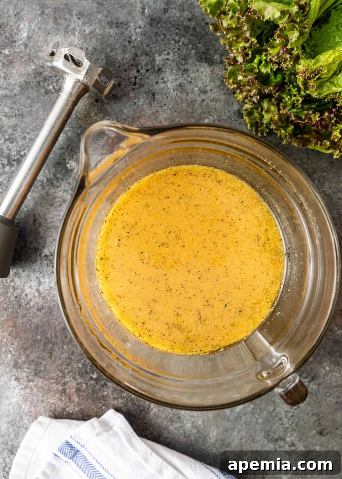 Homemade Italian Dressings Two Ways 7 Overhead view of the Italian salad dressing in a glass measuring cup, perfectly blended and ready to serve.