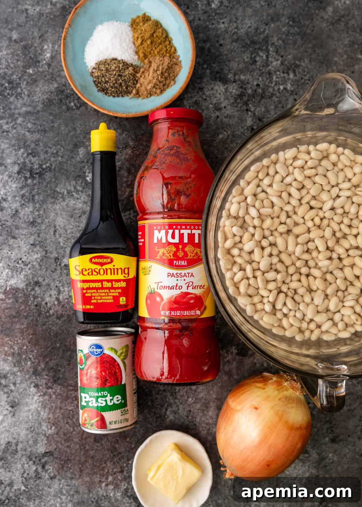 Overhead shot of all the fresh ingredients laid out for making Fasoolia Baida.