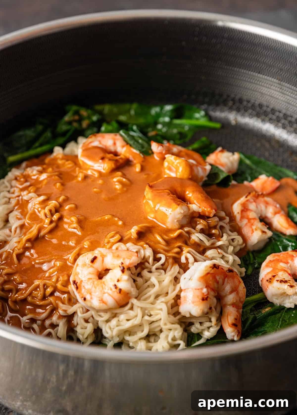 Zesty Gochujang Sesame Noodles 8 sesame gochujang noodles covered in sauce before mixing