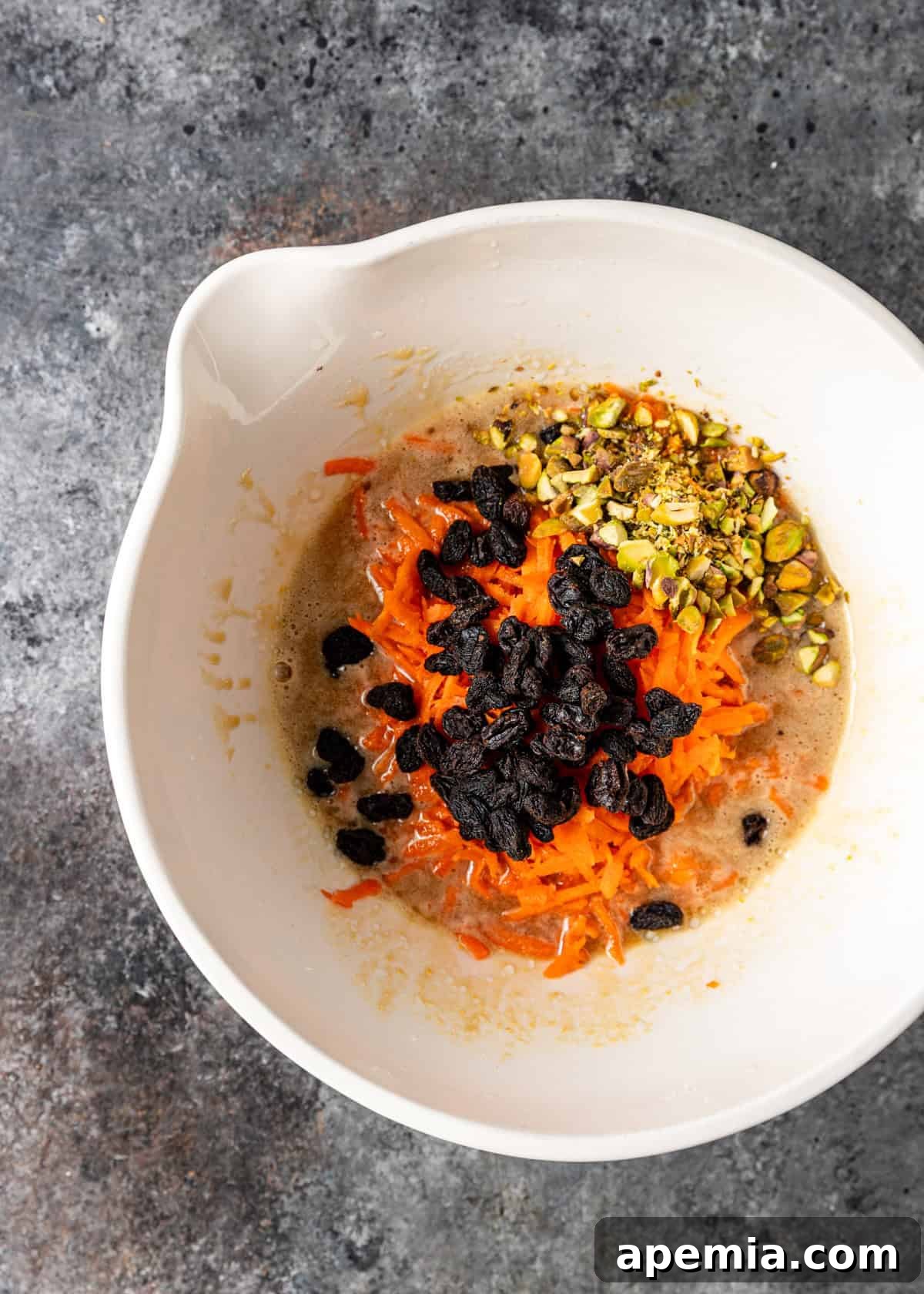 overhead process shot: combining the wet ingredients in a bowl
