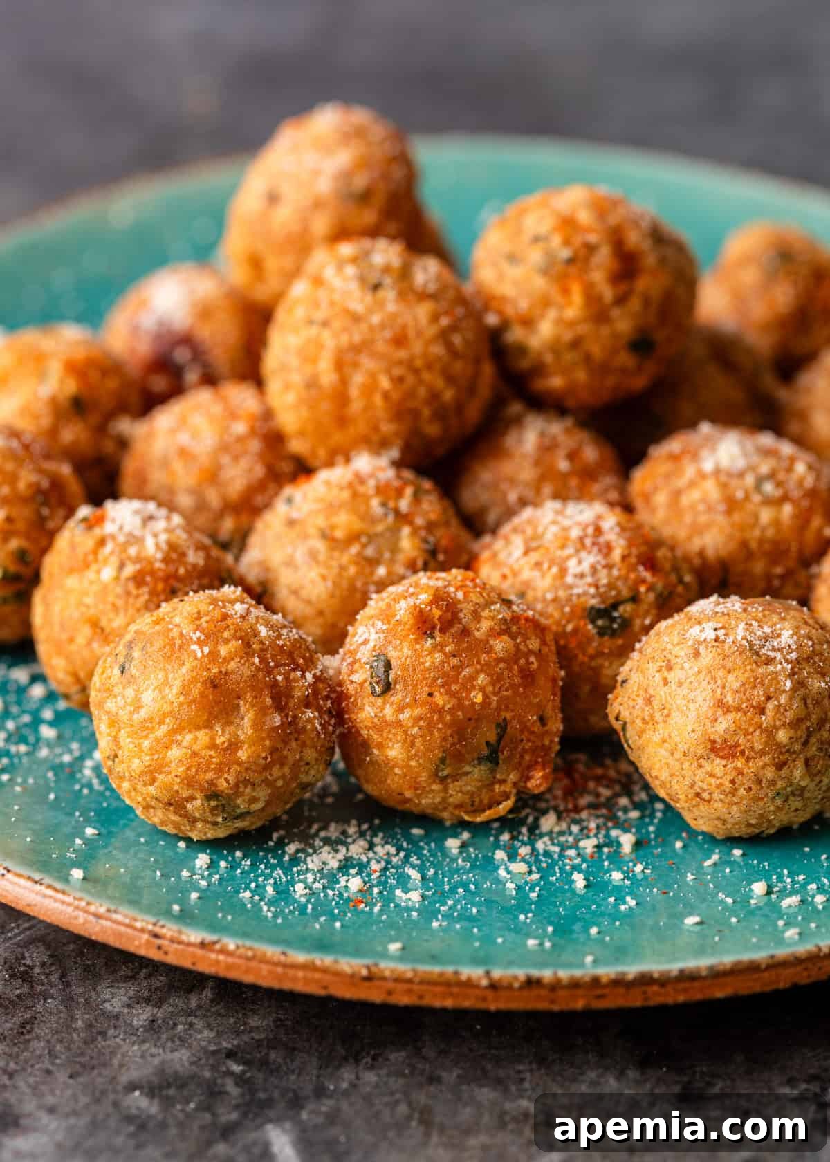 Side view closeup of street style Aloo Tikki sprinkled with seasonings