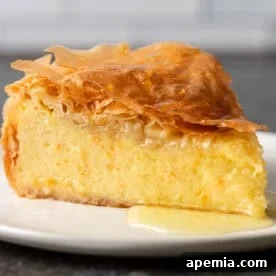 Delicious Galaktoboureko (Greek Filo Custard Pie) with creamy filling and crispy phyllo.