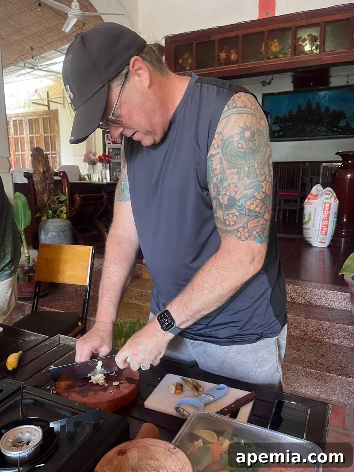Kevin participating in a traditional cooking class in Siem Reap, Cambodia