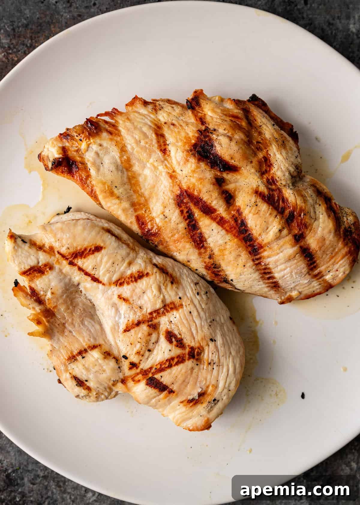 Overhead view of grilled chicken breast prepared for the chicken mango salad recipe