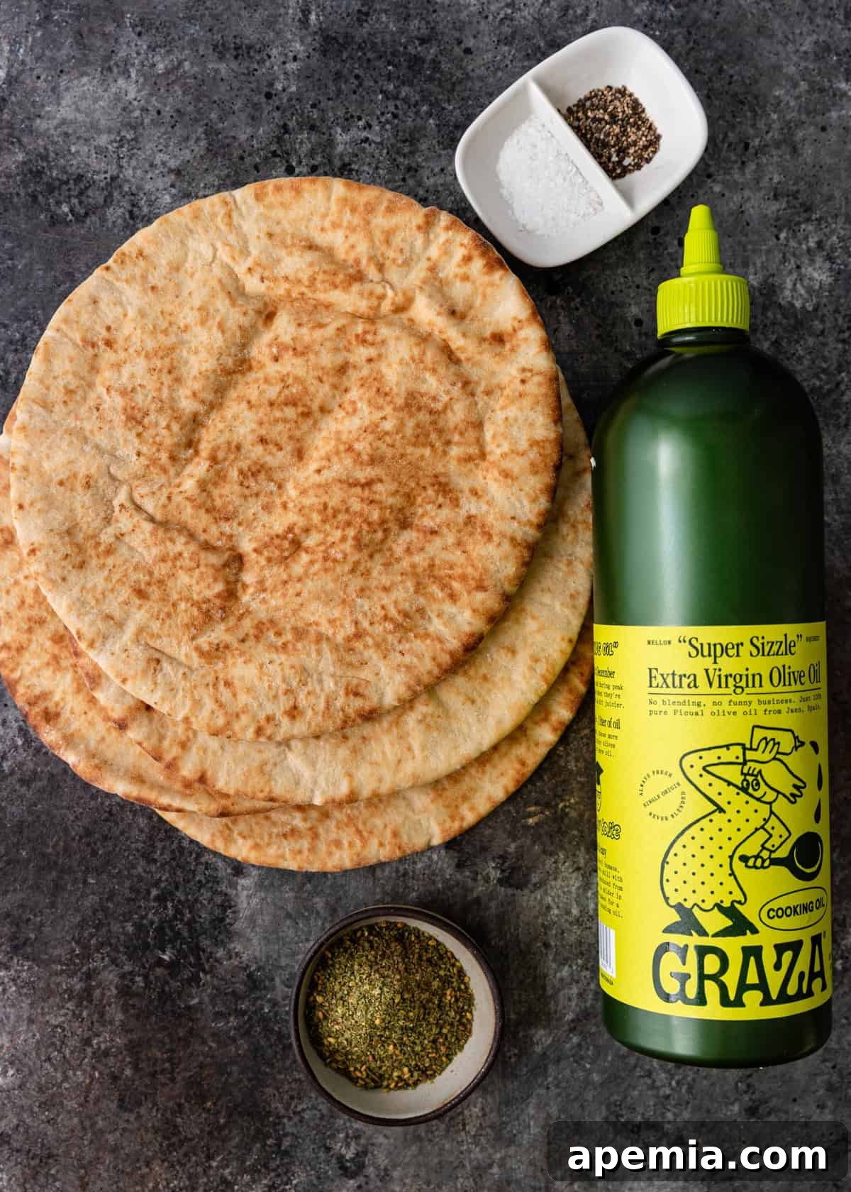 overhead: pita, olive oil, and za'atar needed to make my pita chips recipe