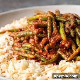A delicious bowl of Egyptian Stewed Green Beans, Fasooliya, perfect for a comforting meal.