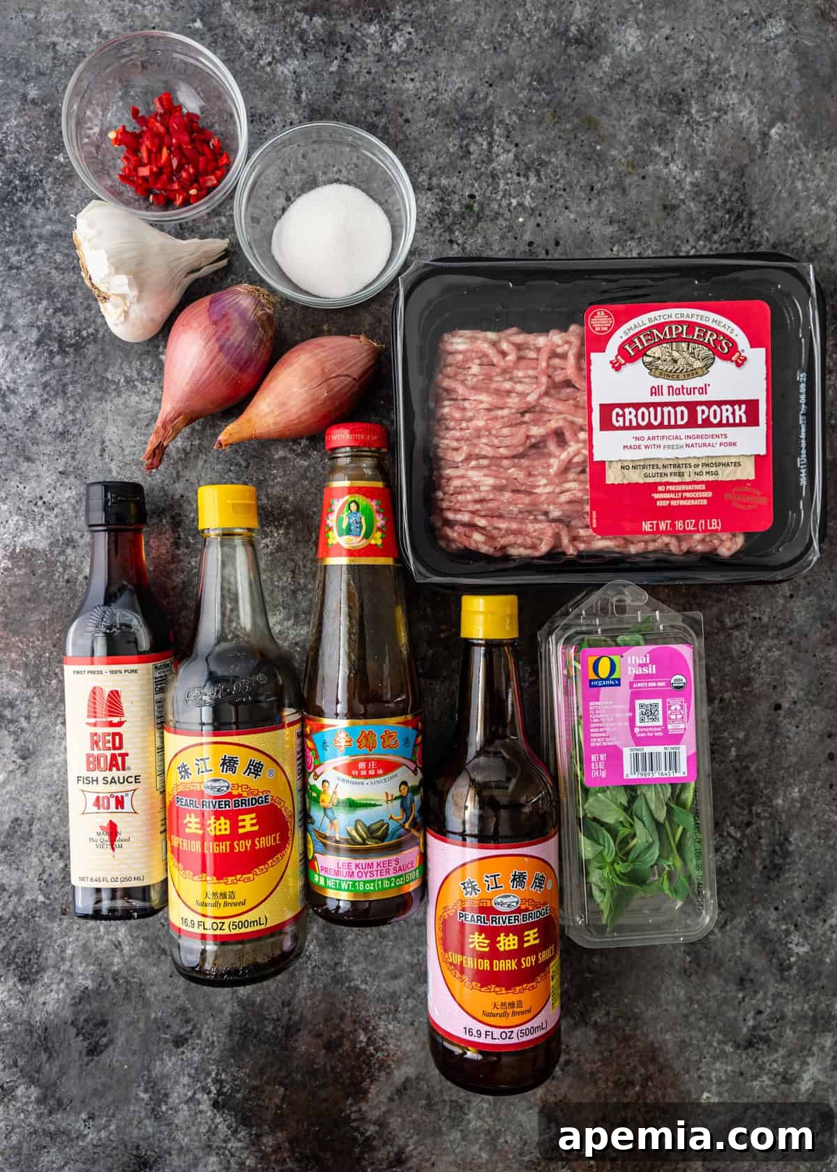 overhead: ingredients needed to make pork and holy basil stir fry