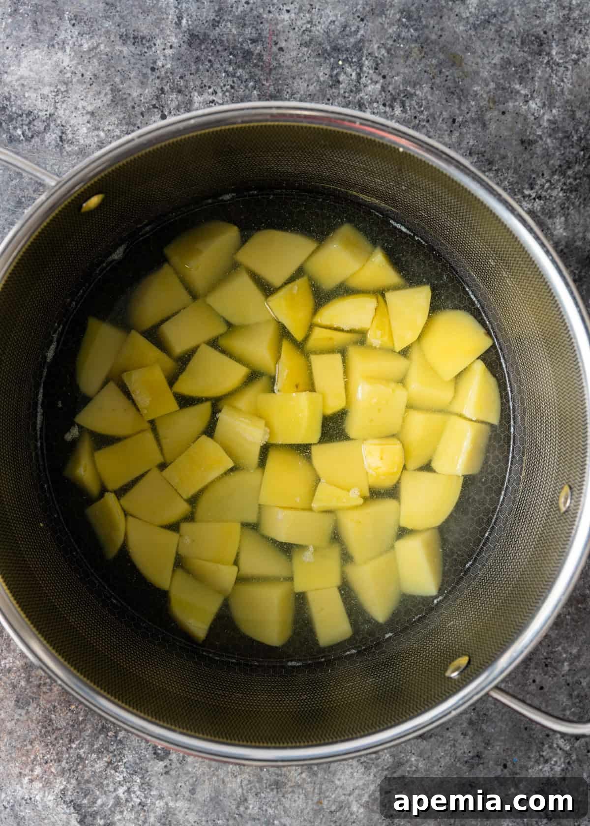 overhead process shot: potatoes boiled to fork tender