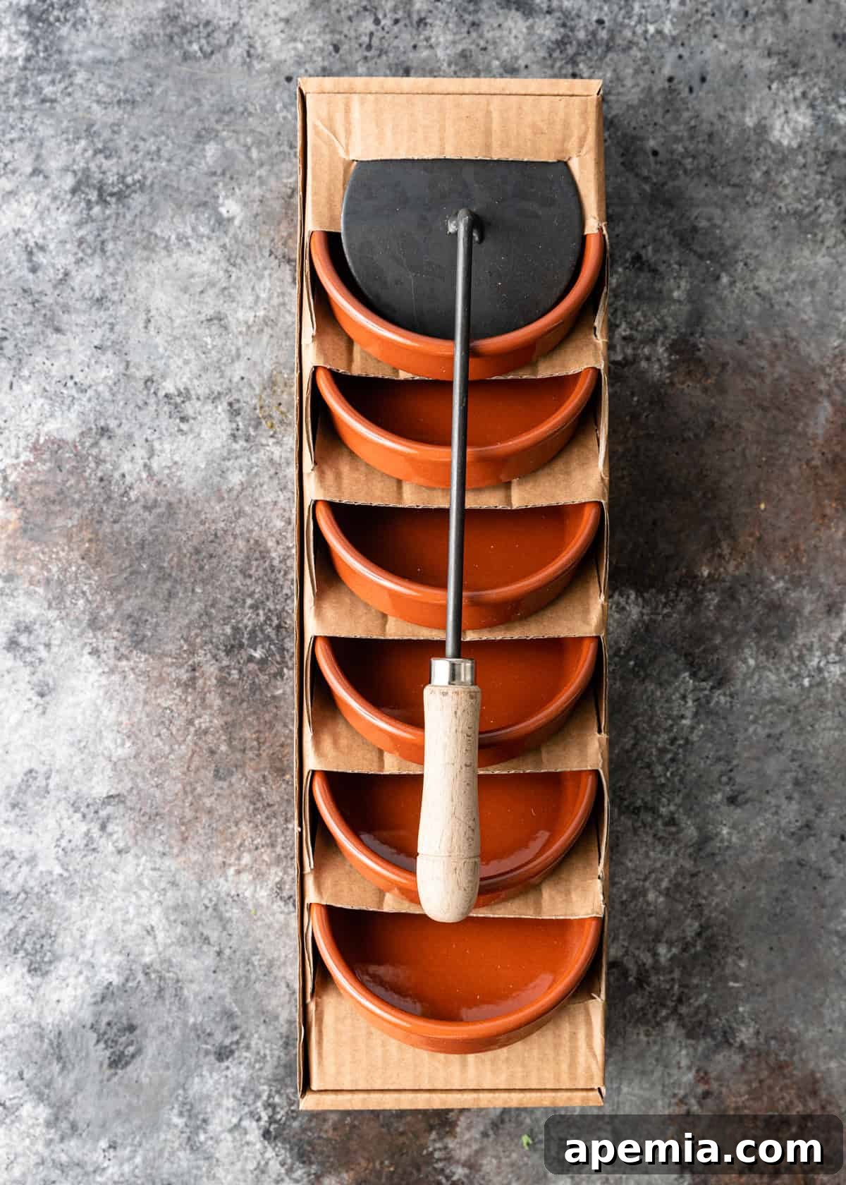 overhead: a set of catalana irons in their packaging