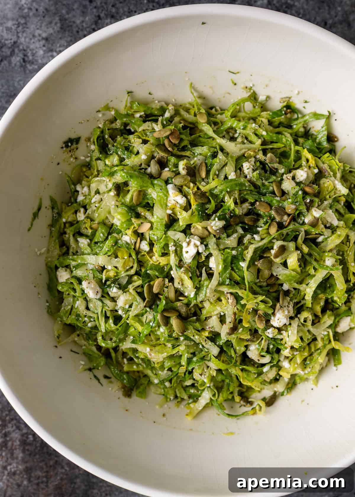 Mediterranean Feta Dill Salad 5 overhead: maroulosalata salad in a bowl with feta and sunflower seeds