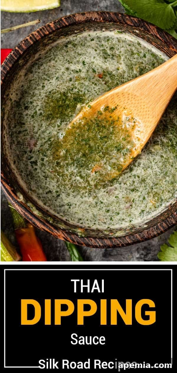 titled image (and shown): thai dipping sauce, garnished with fresh herbs in a white bowl