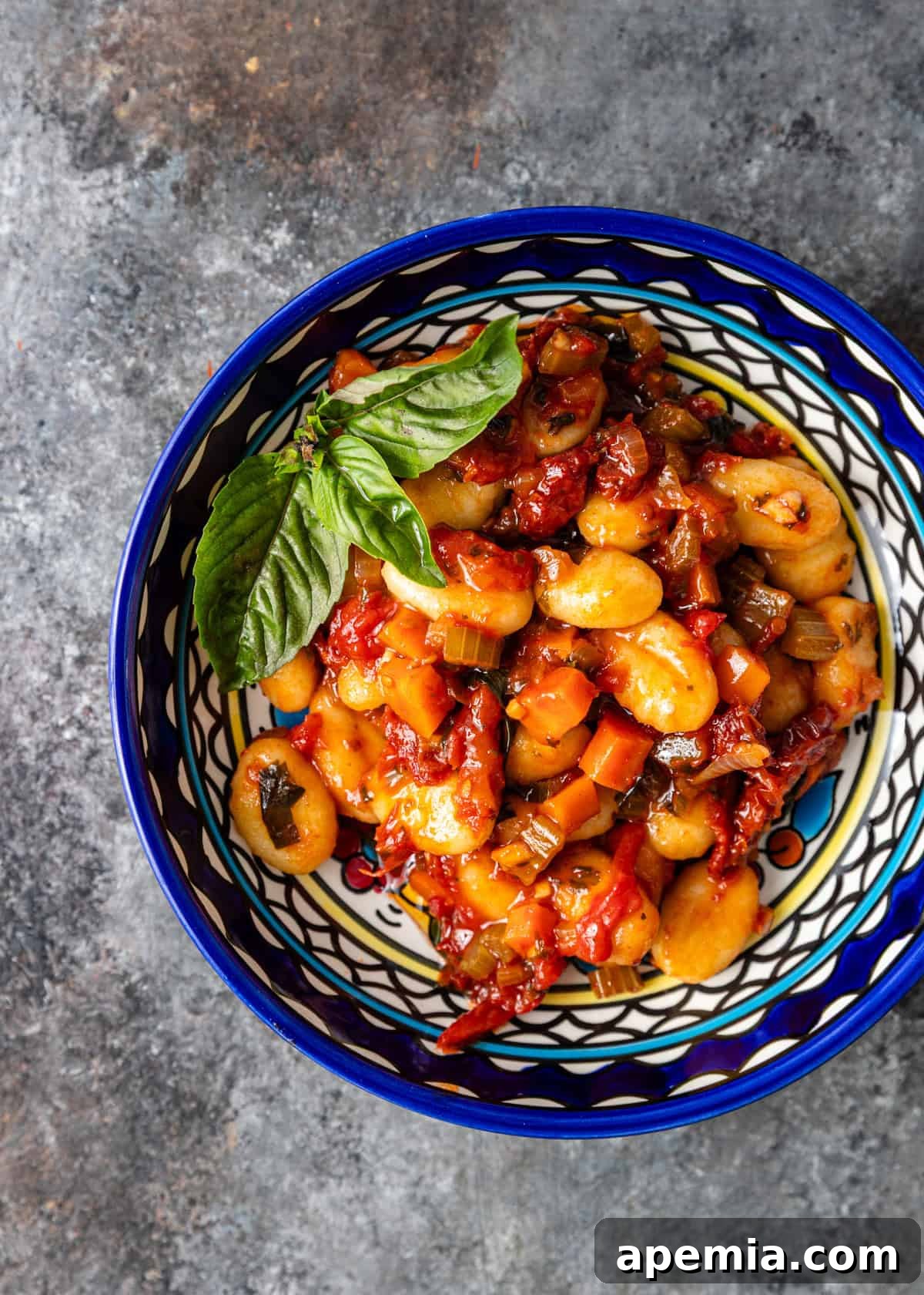 overhead: cooked vegan ragu in bowl, ready to be paired with pasta