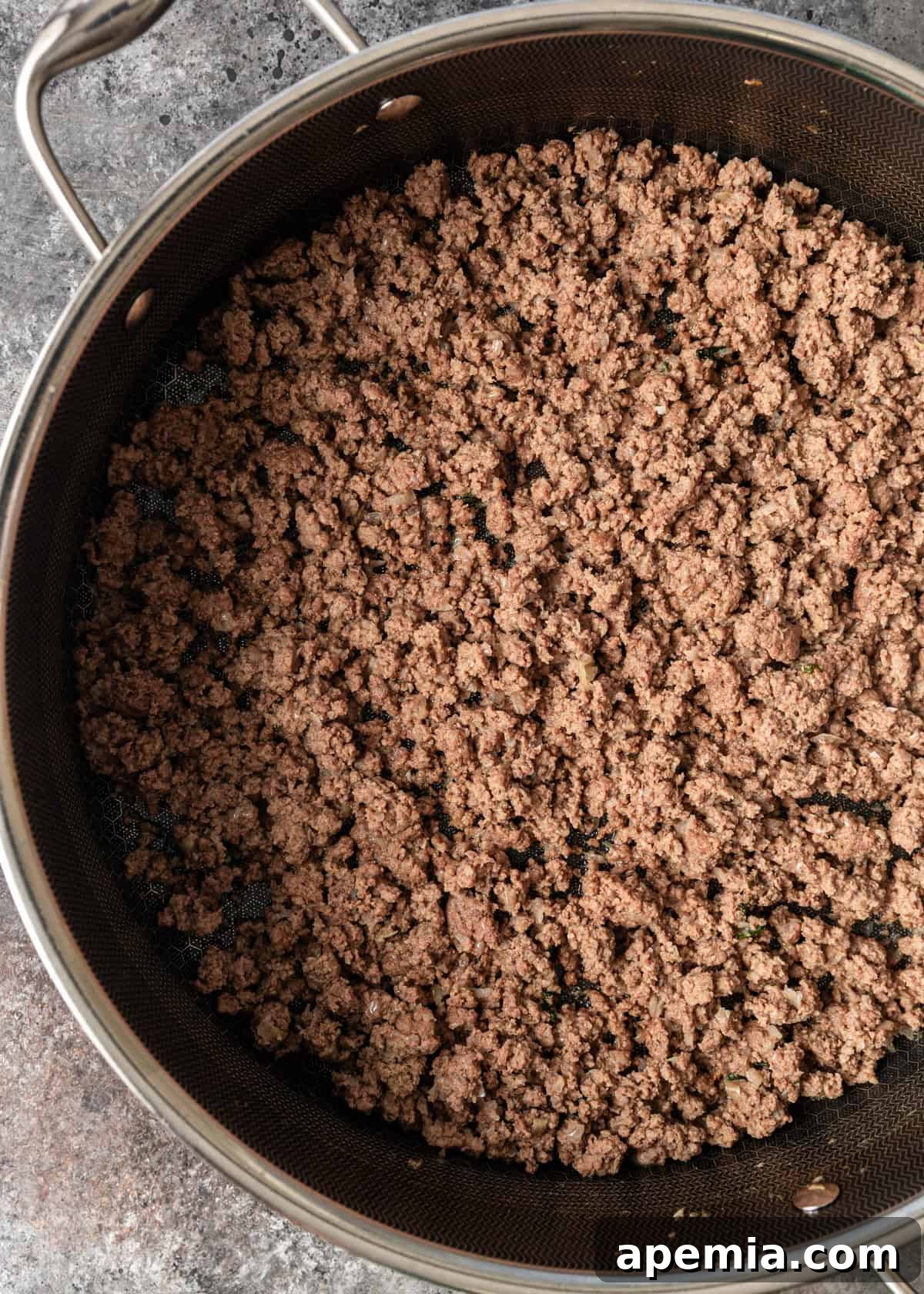 overhead process shot: beef mixture in large skillet