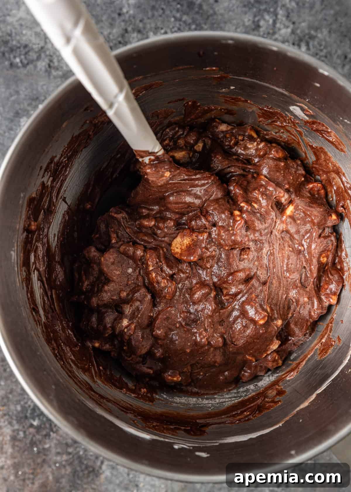 overhead process shot: mosaiko being mixed in mixing bowl