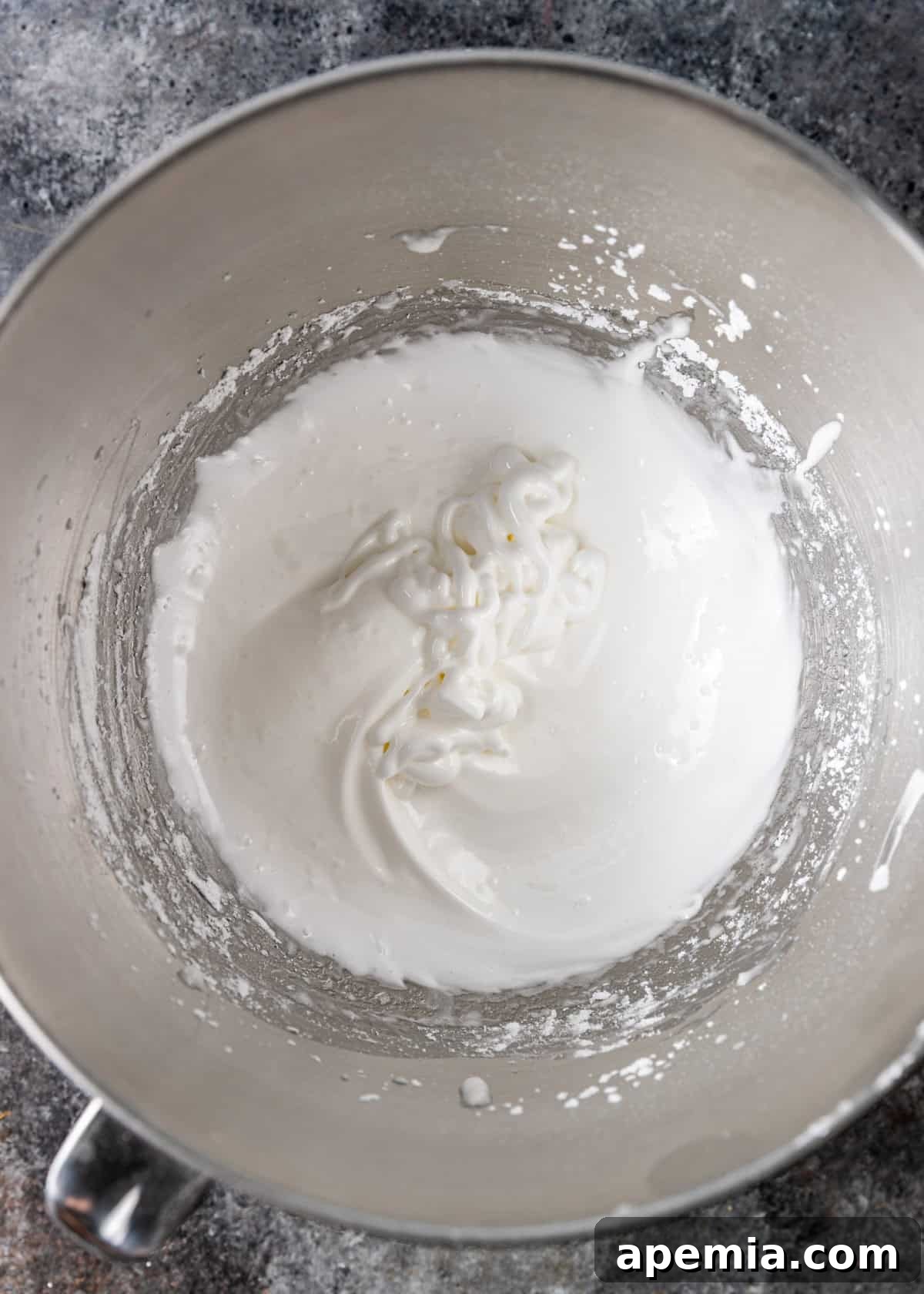 overhead process shot: titled image (and shown) make the meringue