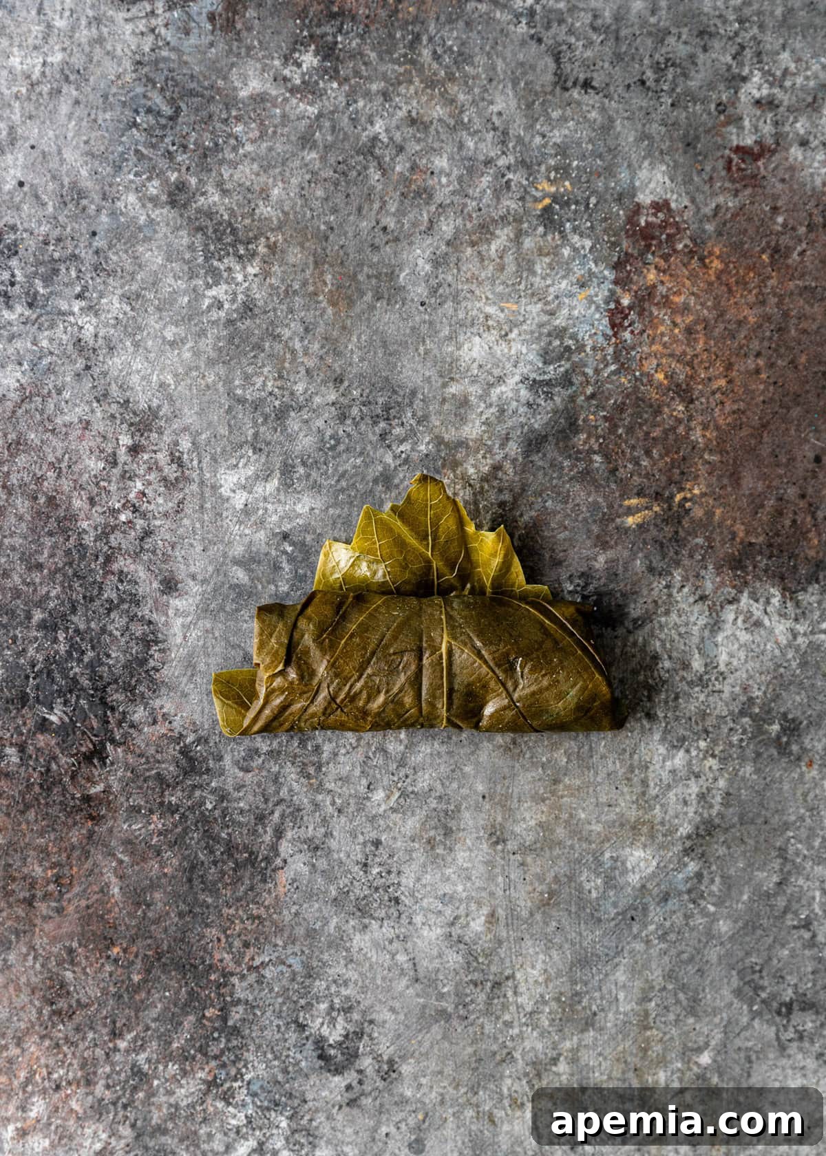 overhead process shot: leaf rolled on counter