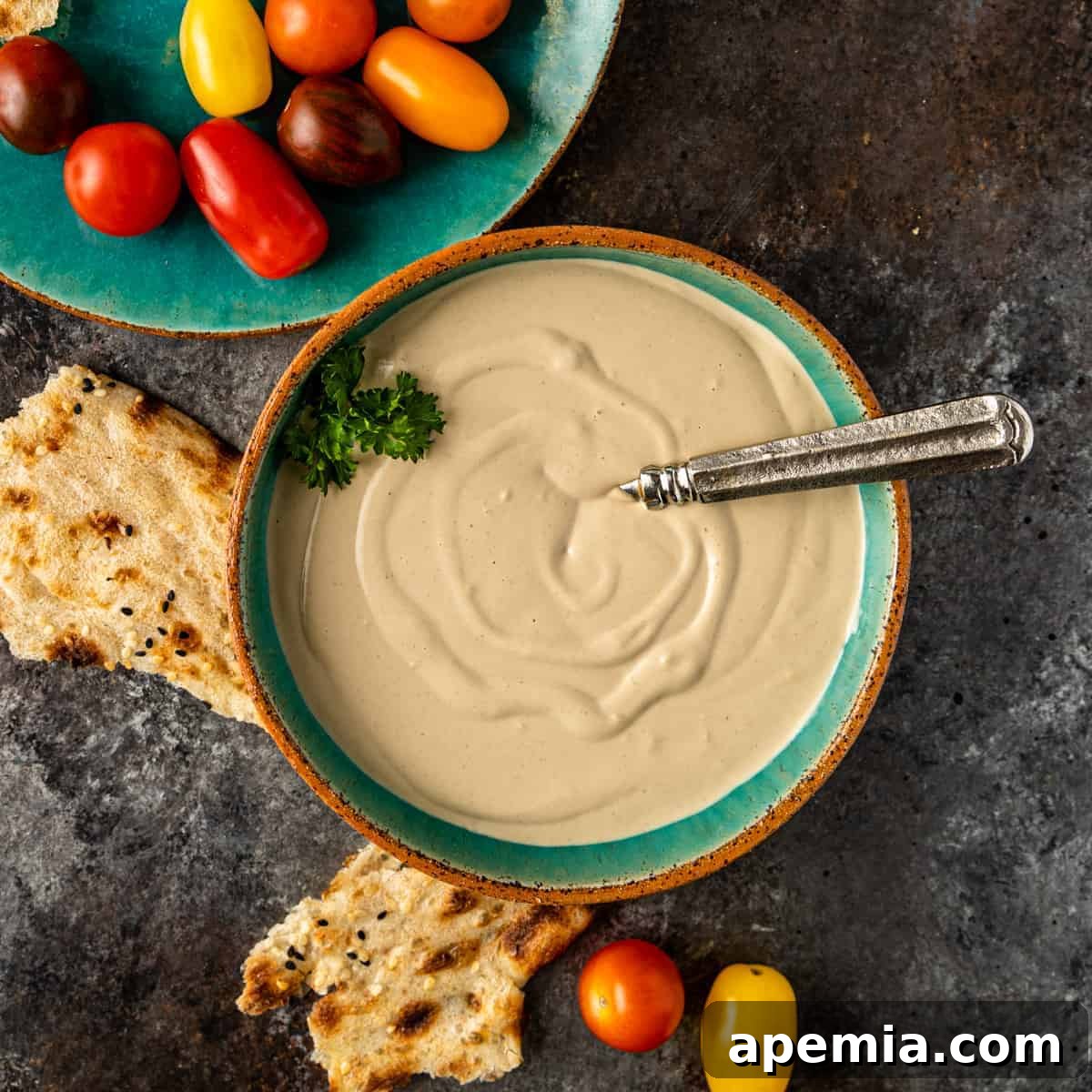 overhead of a bowl of homemade tahini dip