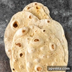 Pieces of Armenian flatbread on a gray counter