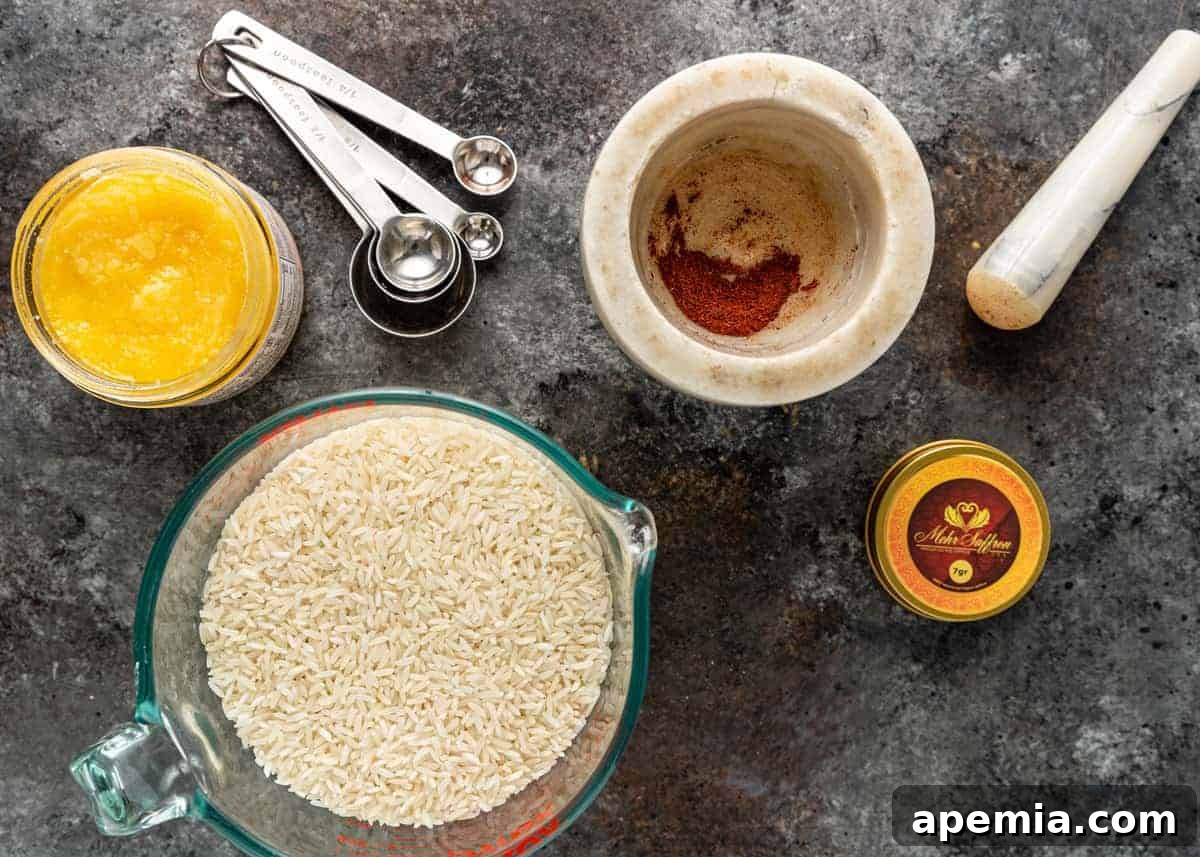 overhead image of ingredients and a mortar and pestle for making Persian rice tahdig recipe