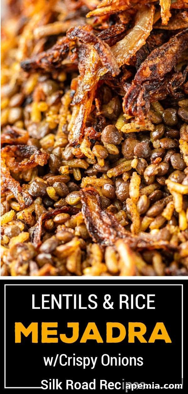 Titled image showing a full plate of lentils and rice mejadra with crispy onions as a centerpiece.