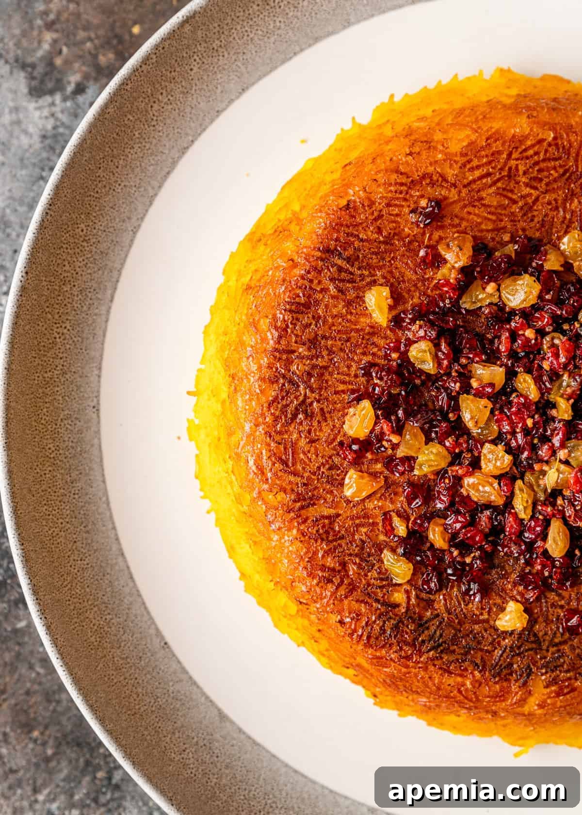overhead: half of a baked tachin on white platter