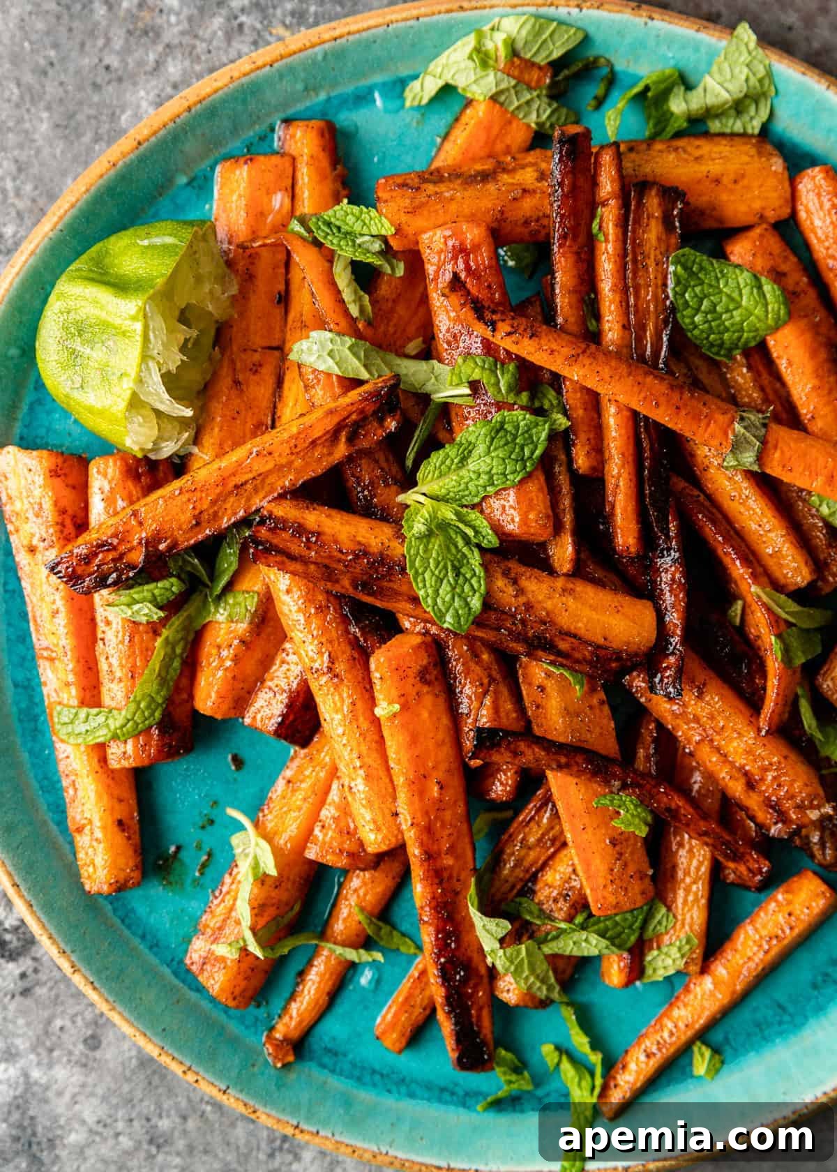 Overhead view of my finished Moroccan roasted carrot recipe, presented beautifully on a plate, ready to be enjoyed.