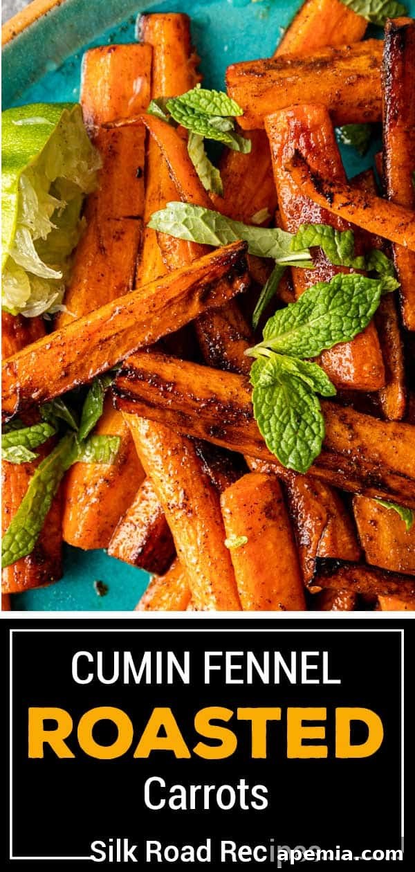 Captivating image of cumin fennel roasted carrots, artfully arranged and ready to be served, showcasing their vibrant color and caramelized texture.
