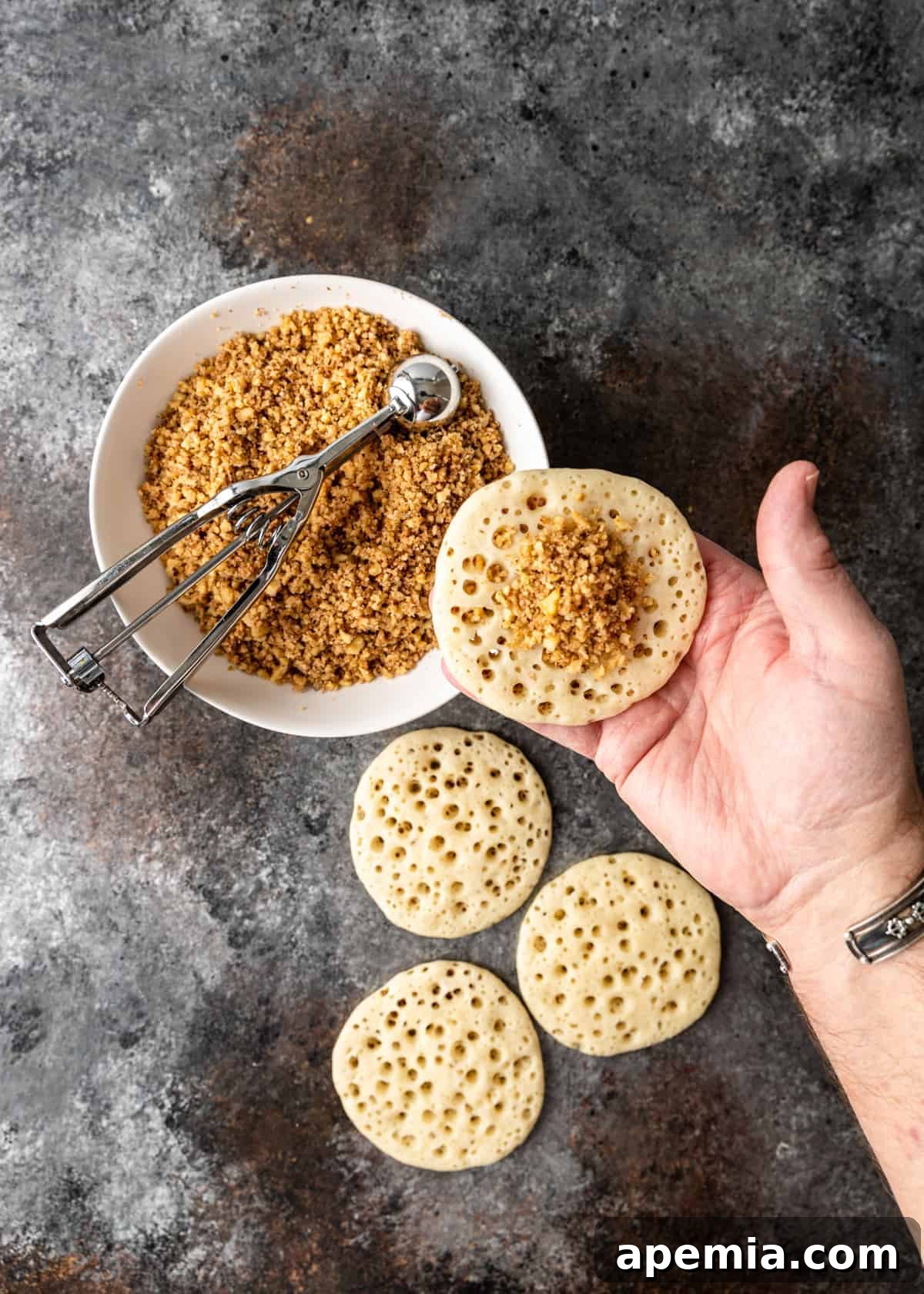 adding filling to pancake