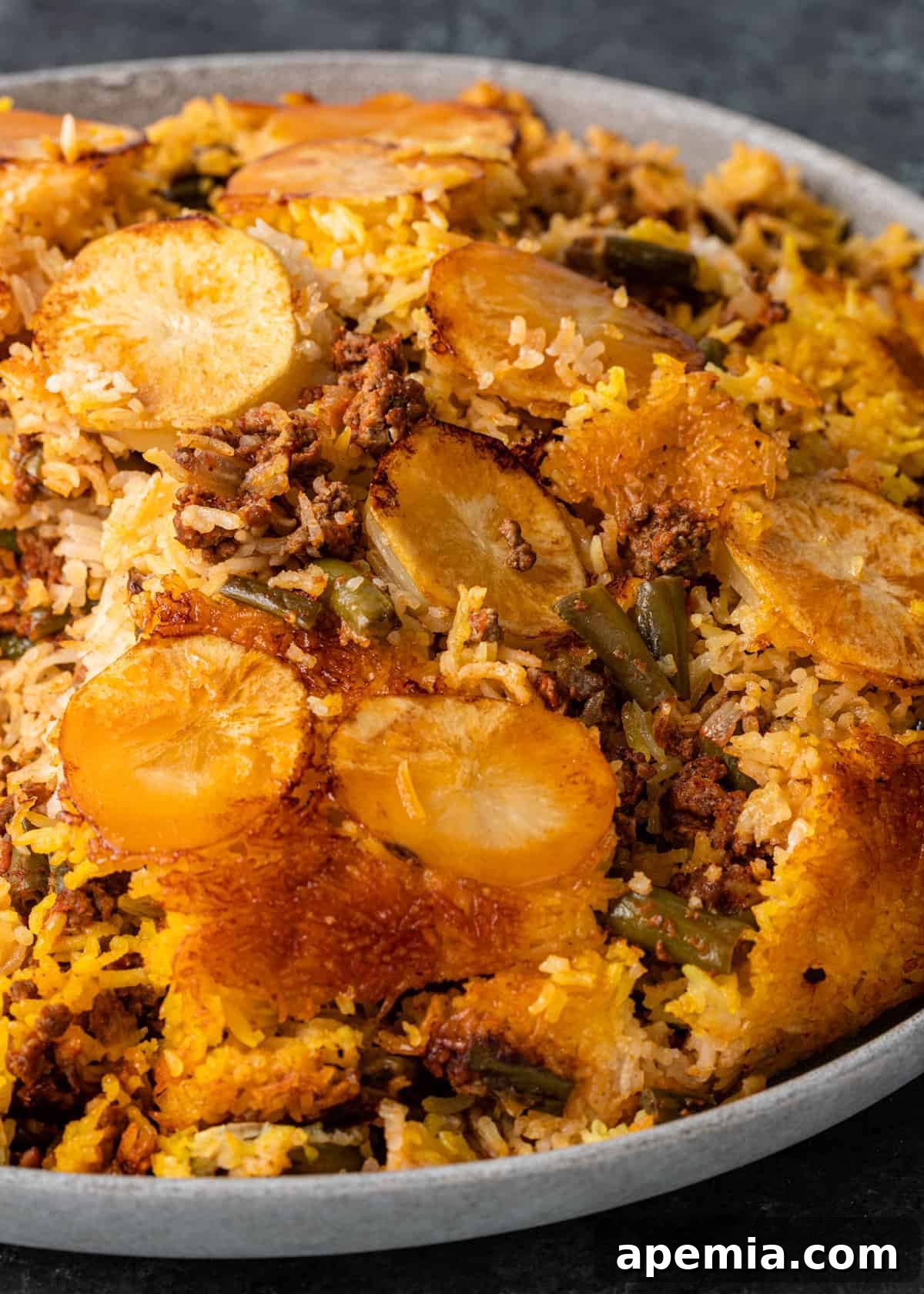 extreme closeup: lubia with potatoes and ground beef