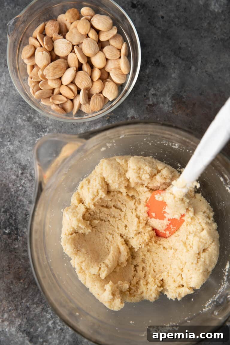 Egyptian Basbousa Golden Semolina Bliss 5 Overhead view of ingredients being mixed together to form the Basbousa batter in a large bowl.