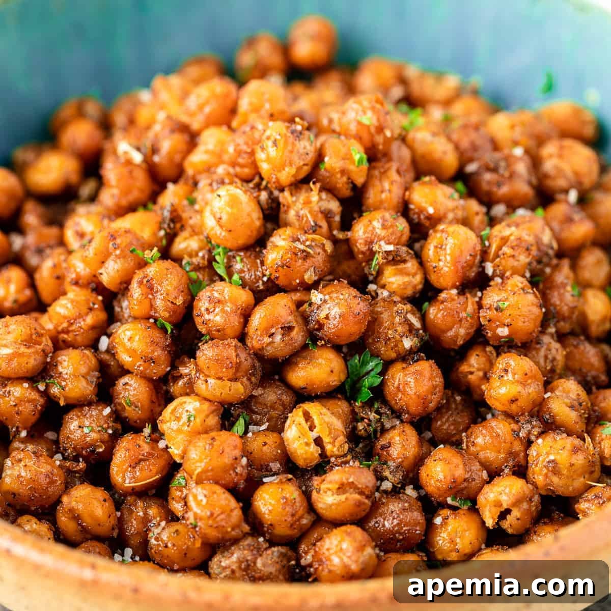 Bowl of perfectly roasted chickpeas, seasoned and crispy