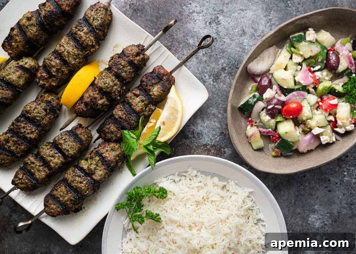 A vibrant platter of freshly prepared Moroccan kefta kabobs, garnished with fresh herbs, showcasing their inviting appeal and authentic presentation.