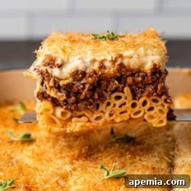 slice of greek lasagna shown close up