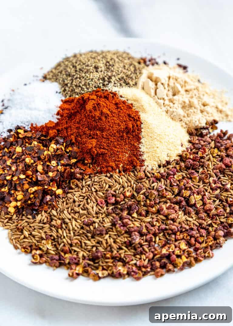Small white plate showcasing finely ground Szechuan seasoning.