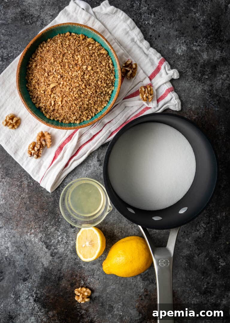 overhead: bowls of walnuts and lemon juice next to saucepan of milk, ingredients for baklava