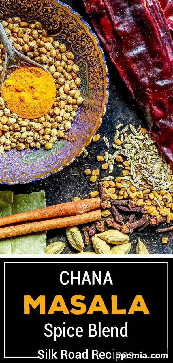 Chana Masala Spice Blend 7 A vibrant selection of whole Indian spices beautifully arranged for making chana masala at home.
